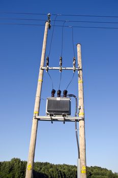 Wooden Utility Pole with Power Lines and transformer on sky background