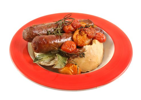 Delicious beef sausage and cherry tomato bake with rosemary.