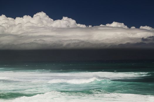 Storm cloud over the Pacific ocean in Maui