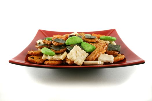 Multi colored Asian rice crackers ready to serve.