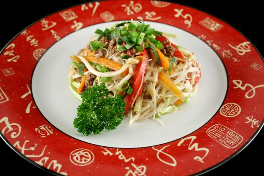 Stirfry beef chow mein with fresh Chinese vegetables.