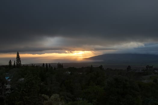 Overcast sunset over the island on Maui