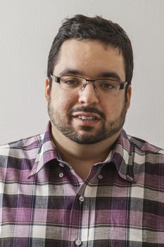 portrait of an overweight man with a beard