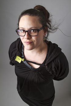 Woman wearing a black dress with wispy flowing hair