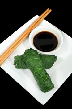 Delightful steamed Asian bok choy rolls ready to serve.