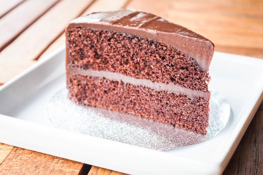 Chocolate chiffon cake serving on white dish