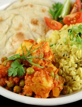 Indian pea and potato curry with tumeric rice and a side salad.