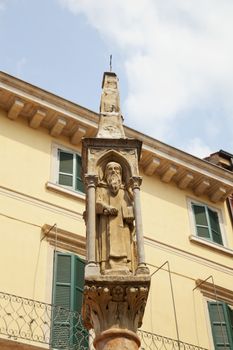 Statue in piazza Bra in Verona, over the top of a column