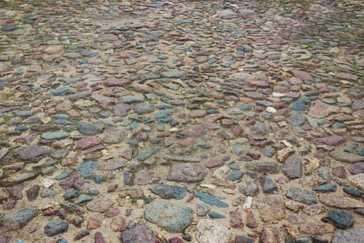 An ancient road paved with unpolished stones