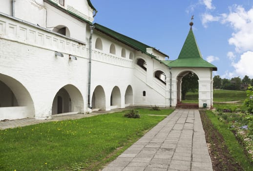 Ancient white stone buildings in the city of Suzdal. Russia