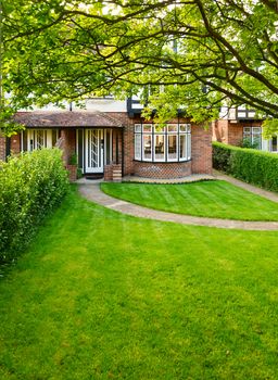 Front lawn of a brick house in England