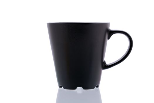 Black cup isolated on white background close up.