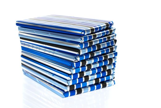 stack of presents in blue silver and black isolated on white background