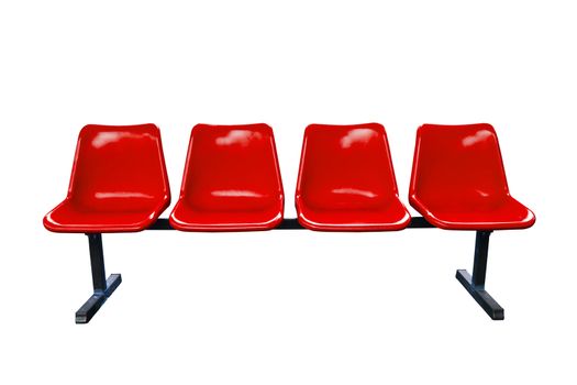 Red plastic chairs at the bus stop isolated on white background