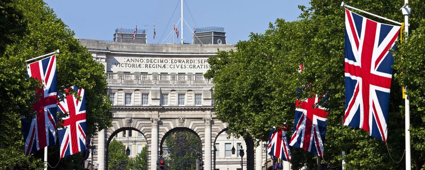 Admiralty Arch and Union Flags down The Mall in London.