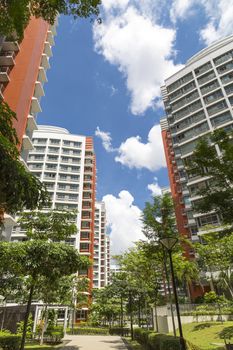 A vertical show of a walkway leading to a new residential estate.