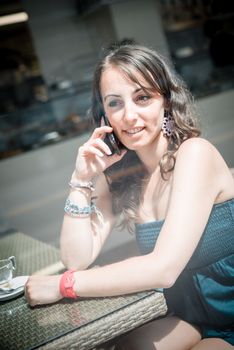 young beautiful woman at the coffee