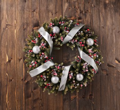 Advent Christmas wreath on wooden door decoration