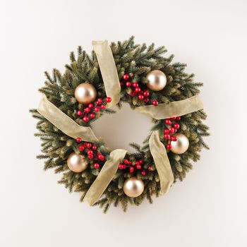 Advent Christmas wreath for door decoration over white