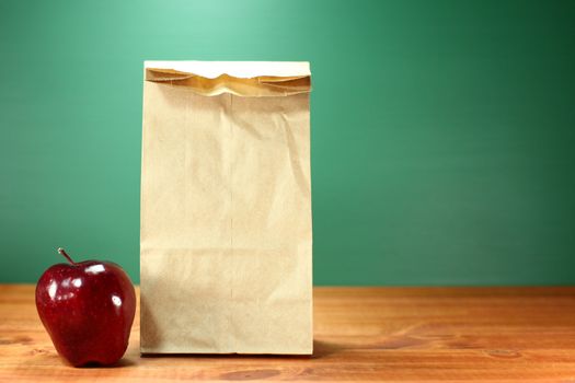 Back to School Lunch Sack Sitting on Teacher Desk