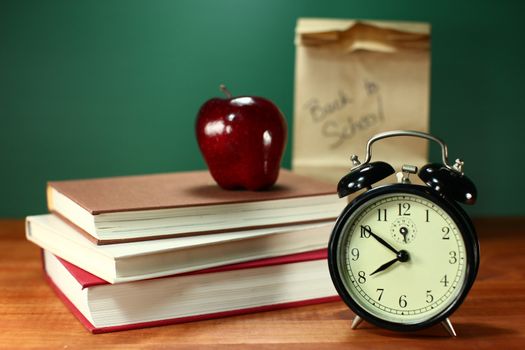 Back to School Books, Lunch, Apple and Clock on Desk