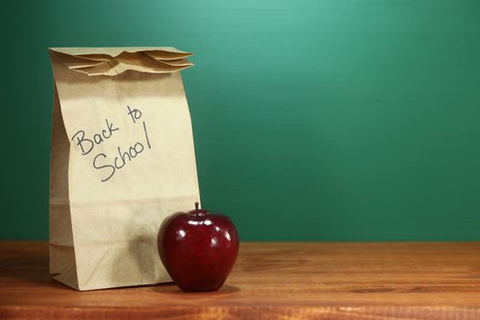 Back to School Lunch Sack Sitting on Teacher Desk