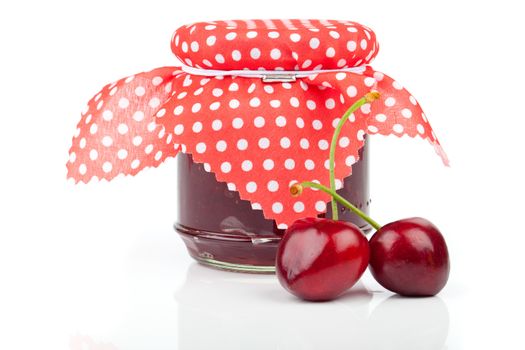 Cherry jam jar isolated on white