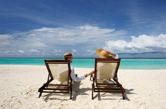 Couple on a tropical beach at Maldives