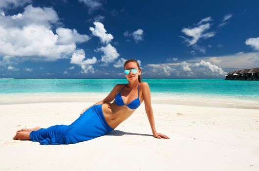 Woman in bikini at tropical beach