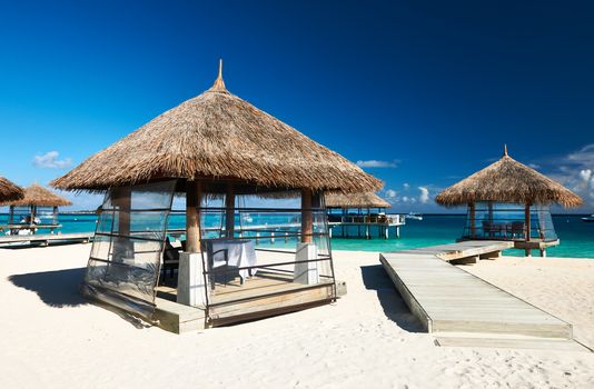 Beautiful beach with bungalow jetty at Maldives