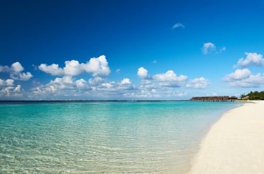 Beautiful beach with water bungalows at Maldives