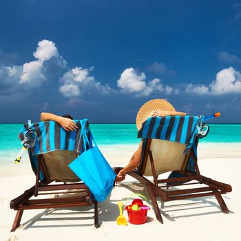 Couple on a tropical beach at Maldives