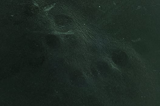 Close up texture of Black cow leather for use as Background