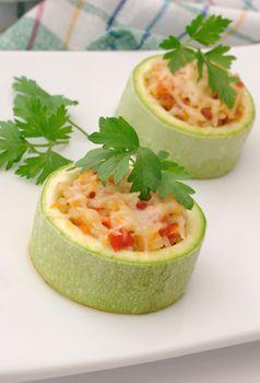 Ring of zucchini stuffed with vegetables with rice and cheese