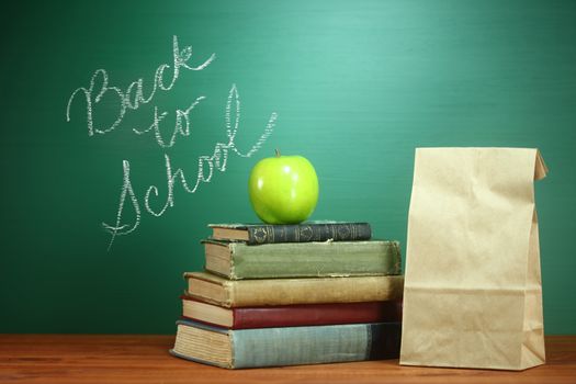 Back to School Books, Apple and Lunch on Teacher Desk