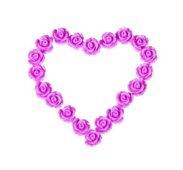 Plastic roses lilac color in the form of heart. Isolated on white background