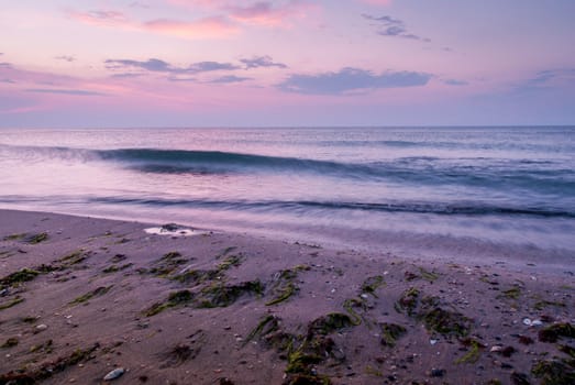 Beautiful seascape with orange warm sunrise, vacation concept