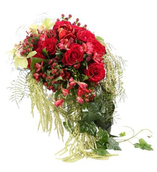 Floral composition with red roses and decorative Hypericum. Flower Arrangement. Isolated image on white background.