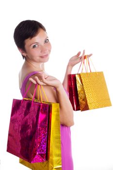 Smiling woman with shopping bags isolated on white