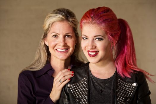 Joyful white female parent and child indoors