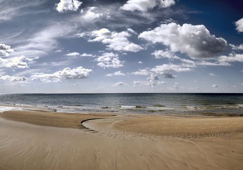 Baltic sea beach, early morning. Sunrise in autumn.