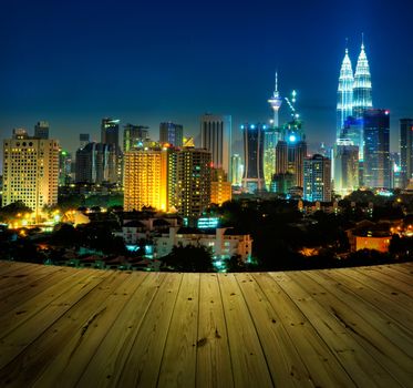 Kuala Lumpur city view and wooden floor.