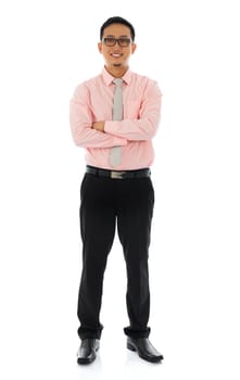 Full body young Asian businessman smiling, front view. Standing isolated on white background