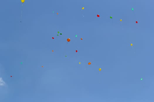 color balloons flying to the sky