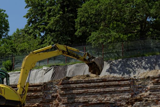 the excavator working on a construction site