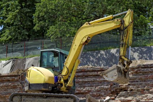 the excavator working on a construction site