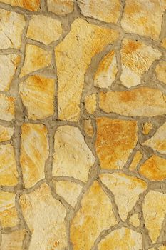 Background of a large stone wall texture (yellow)