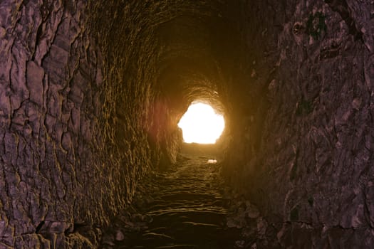 cave in the rock, towards the white light as exit