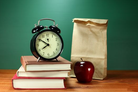 Back to School Books, Lunch, Apple and Clock on Desk