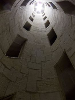 View of the inside of the double helix staircase, looking up towards the light at the top, in Chateau Chambord, France